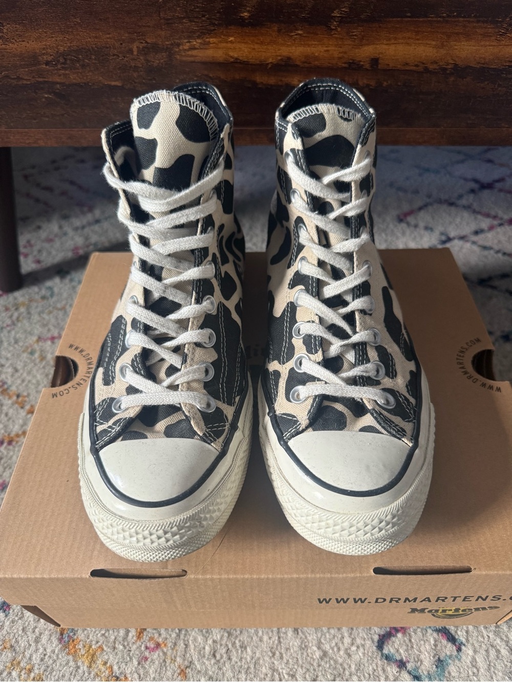 Converse High-Top Sneakers in Black and Cream with Cow Print